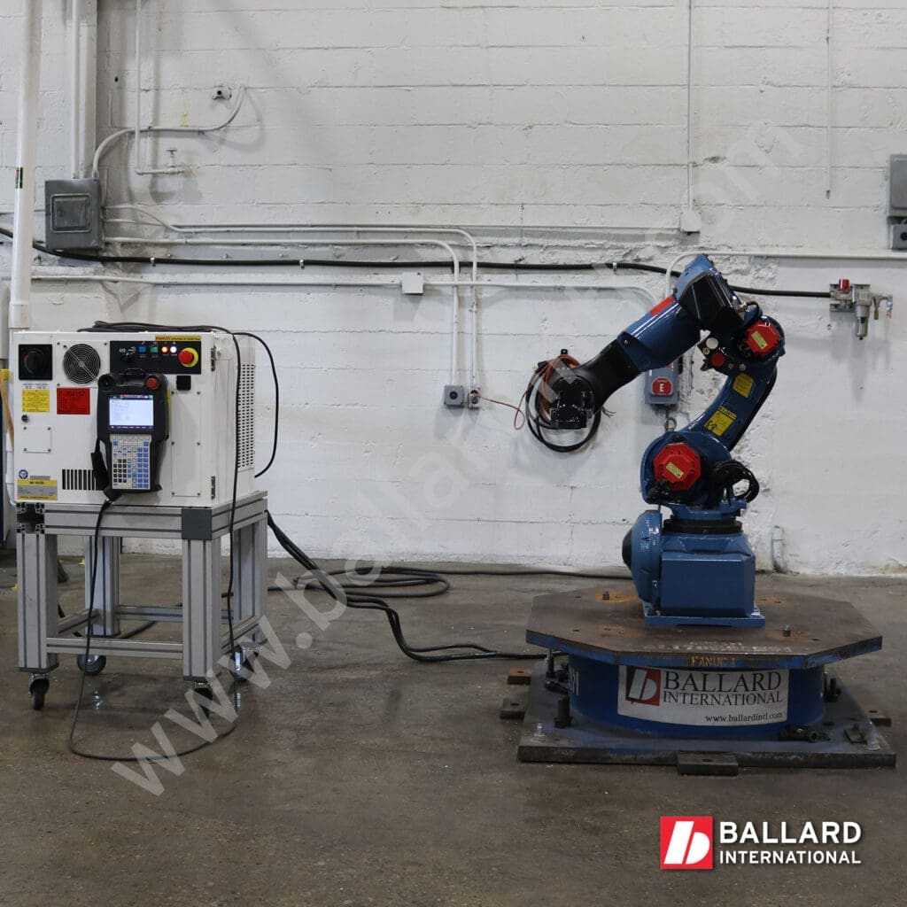 FANUC F264157 M-10iD 16S with R30iB Plus Controller left facing view used industrial robot