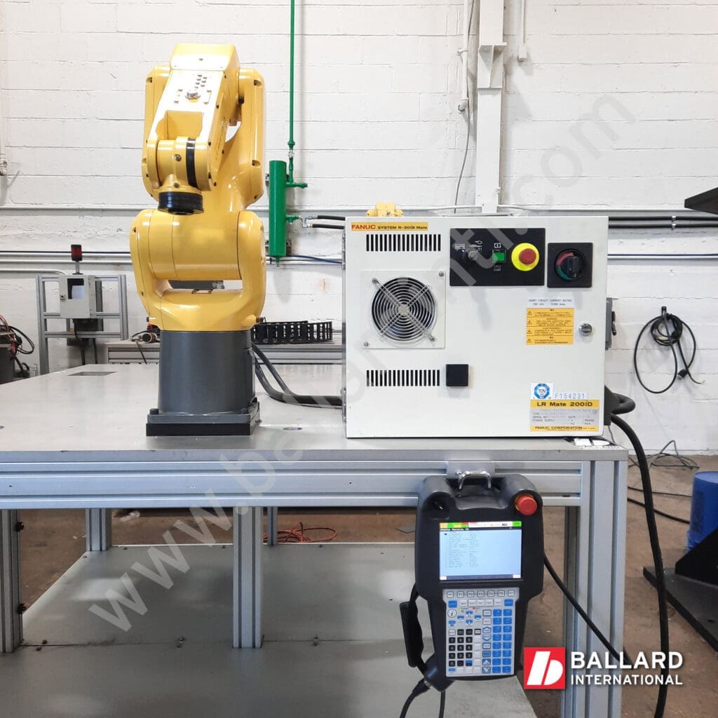 FANUC LR Mate 200iD with R30iB Mate Controller cabinet with teach pendant and tables, complete used industrial robot system under power F154231