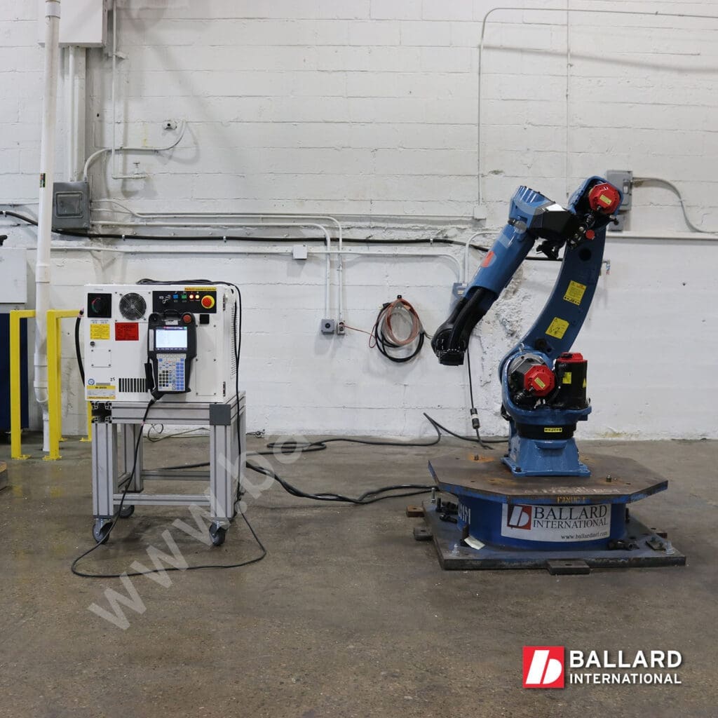 FANUC M-20iD/25 used industrial robot with R30iB Controller left facing view under power