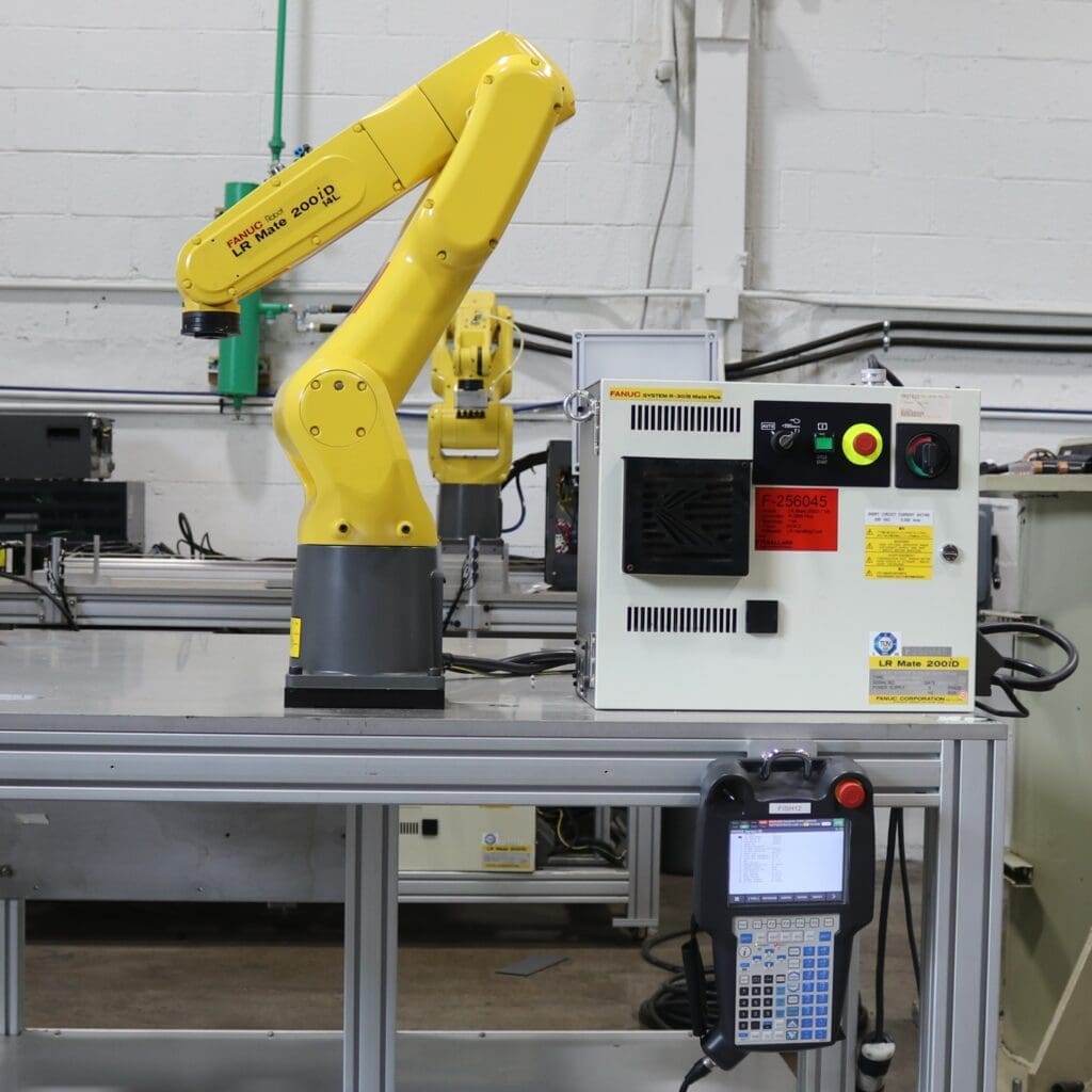 FANUC used industrial robot LR Mate 200iD/14L with R30iB Mate Plus Controller under power with teach pendant F256045